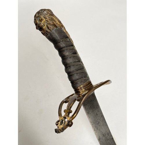 9209 - A 19th Century sabre, the gilt brass pierced hilt (elements missing) with lion head pommel, shagreen... 