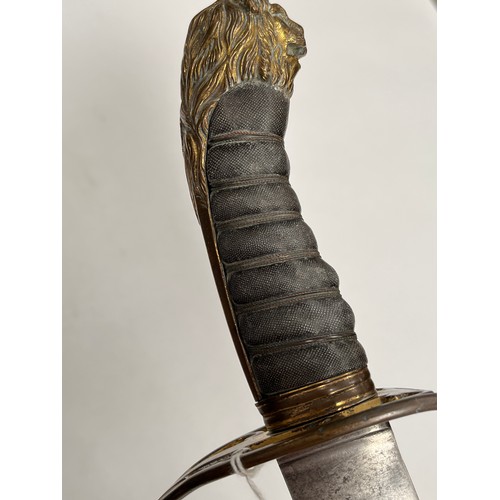 9209 - A 19th Century sabre, the gilt brass pierced hilt (elements missing) with lion head pommel, shagreen... 