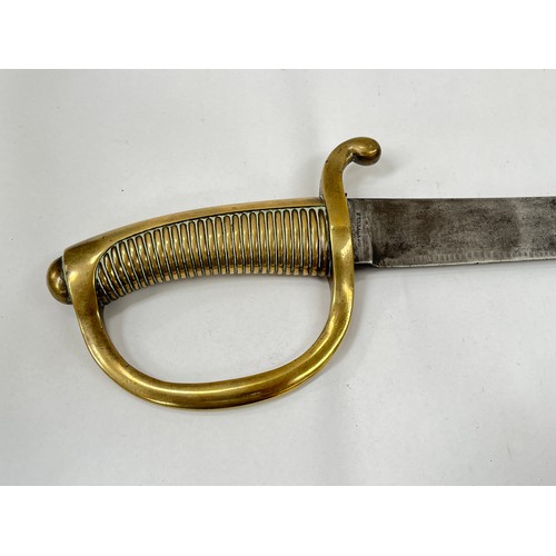 9212 - A 19th Century French Infantry briquet sidearm of cutlass form, brass ribbed hilt with D-shaped knuc... 