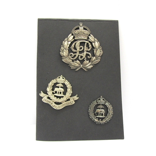 9421 - Three various Colonial Police badges: India police helmet badge, Nigeria cap badge and collar badge ... 