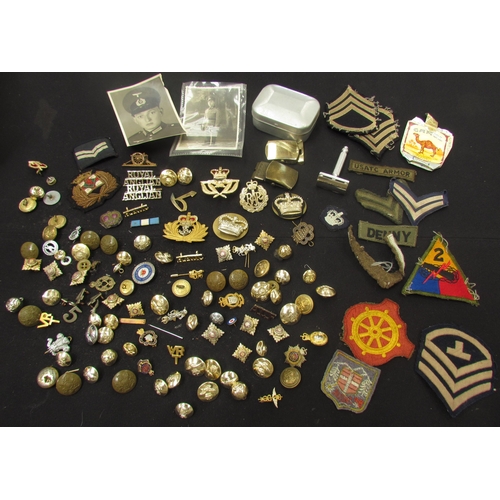 9464 - A box of military insignia, mainly British, including staybrite