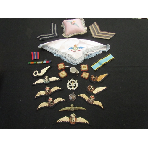 9465 - A collection of RAF / Commonwealth badges and insignia including New Zealand, Australia, and Royal F... 