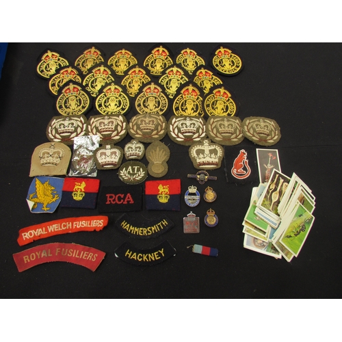 9466 - A collection of British military insignia including Civil Defence and Desert Rats etc