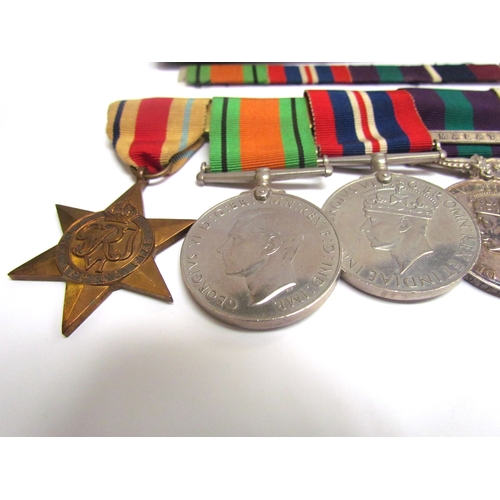 9480 - A WWII and later medal group of five consisting of Africa Star, Defence Medal, War Medal, George VI ... 