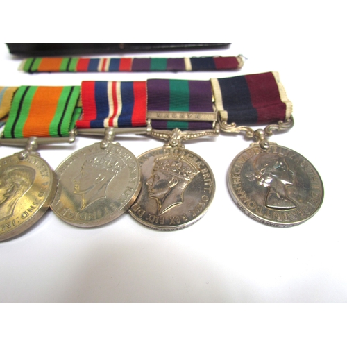 9480 - A WWII and later medal group of five consisting of Africa Star, Defence Medal, War Medal, George VI ... 