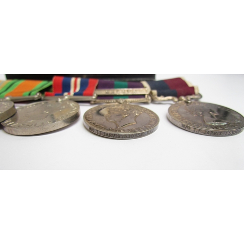 9480 - A WWII and later medal group of five consisting of Africa Star, Defence Medal, War Medal, George VI ... 