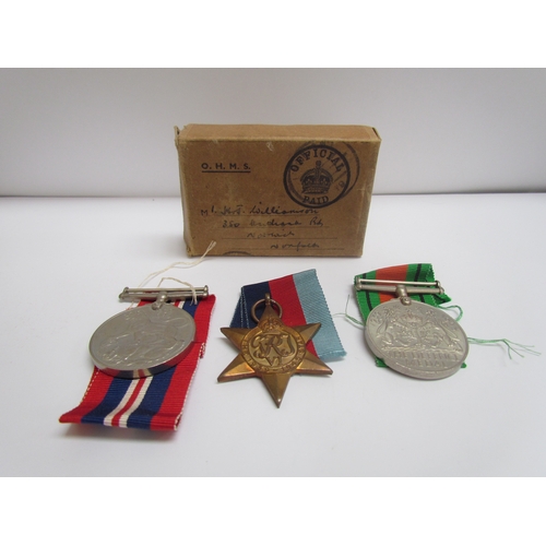 9482 - Three WWII medals of Defence, War and 1939-45 Star to John Williamson with original box of issue