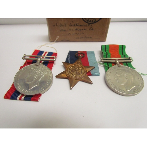 9482 - Three WWII medals of Defence, War and 1939-45 Star to John Williamson with original box of issue