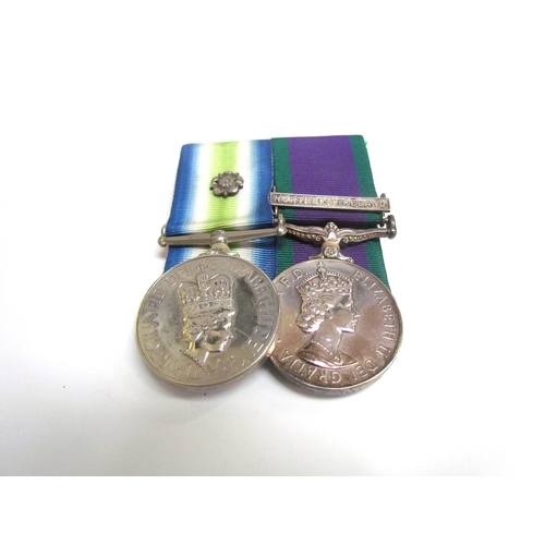 9474 - A South Atlantic Medal (1982) with rosette denoting service in the combat zone, for personnel who to... 