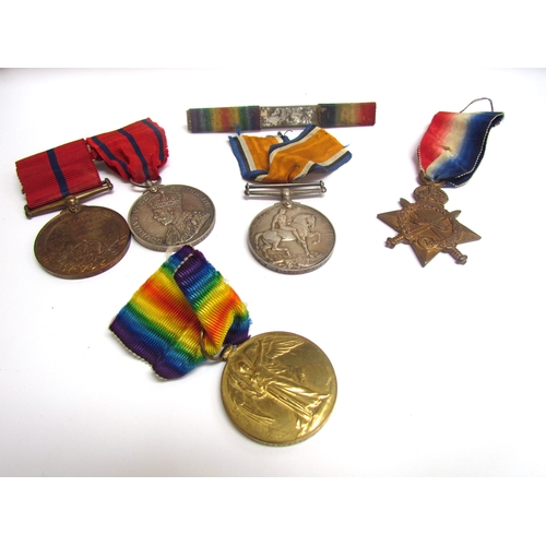 9478 - A WWI and later medal group of six consisting of WWI 1915 trio (the star named to RTS-5418 DVR-A.SD.... 