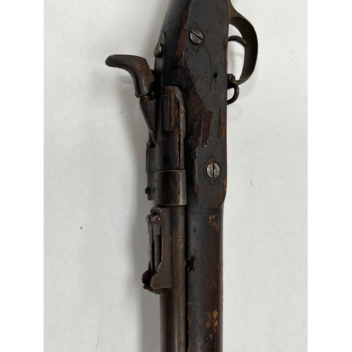 9219 - A Snider three band military rifle, the lock stamped VR Enfield with various stock and barrel inspec... 