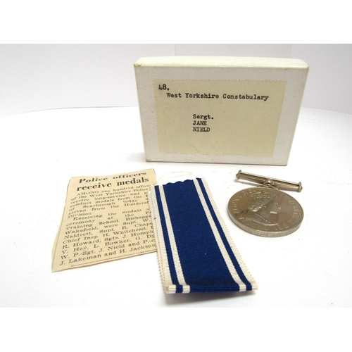 9436 - An EIIR Police Long Service Medal to policewoman Sergt. Jane Nield West Yorkshire Constabulary, with... 