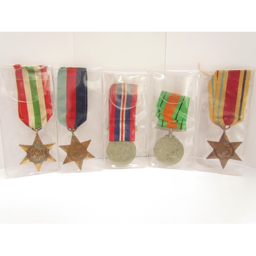 9448 - A quantity of WWII medals, documents, letters, and photographs relating to S/5831216 S/SGT. G.G. KIR... 