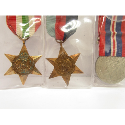 9448 - A quantity of WWII medals, documents, letters, and photographs relating to S/5831216 S/SGT. G.G. KIR... 