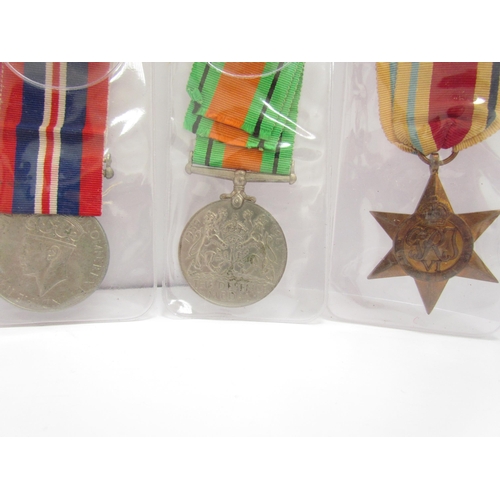 9448 - A quantity of WWII medals, documents, letters, and photographs relating to S/5831216 S/SGT. G.G. KIR... 