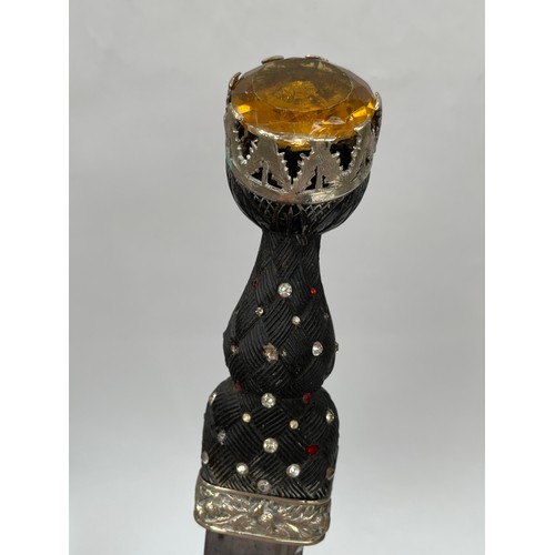 9222 - A piper's dirk by Lawrie of Glasgow, carved basket-weave handle, the pommel with artificial gemstone... 