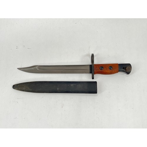 9230 - A British No. 5 Jungle Carbine bayonet by Wilkinson marked WSC, with scabbard