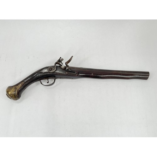 9239 - An 18th Century Continental long barrel flintlock pistol. ANTIQUE ITEM: NO LICENSE REQUIRED   (C)