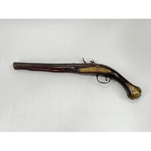 9239 - An 18th Century Continental long barrel flintlock pistol. ANTIQUE ITEM: NO LICENSE REQUIRED   (C)