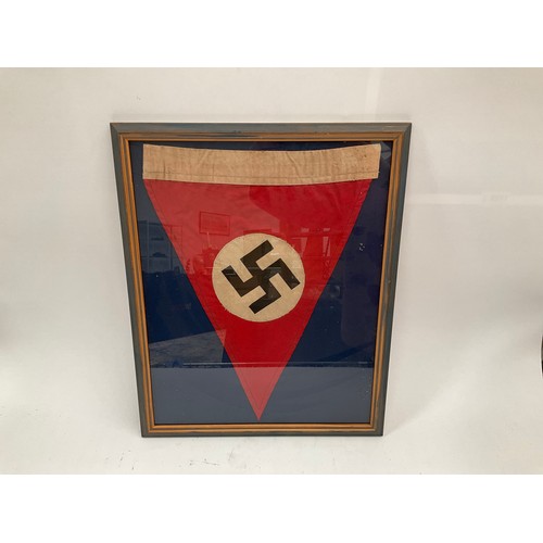 9306 - WITHDRAWN A reproduction German Nazi party pennant, framed and glazed