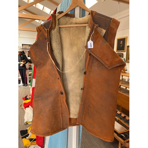 9496 - An early 20th Century leather and sheepskin lined jerkin, Royal Flying Corps style a/f