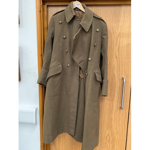 9499 - A WWII Royal Engineers officer's trench coat with King's crown buttons and Lieutenant Pips