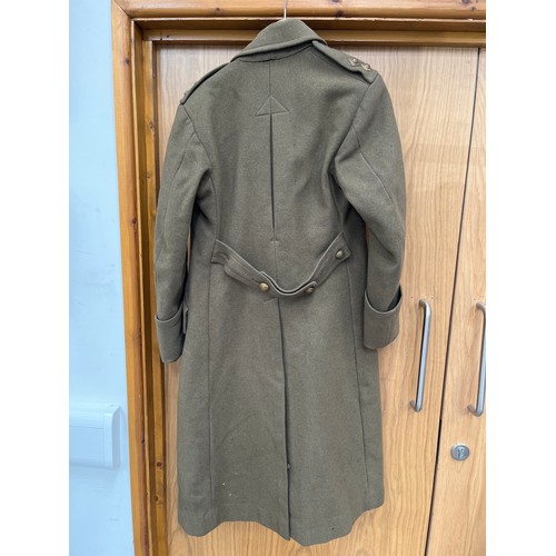 9499 - A WWII Royal Engineers officer's trench coat with King's crown buttons and Lieutenant Pips