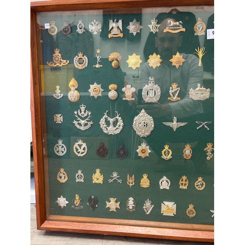 9502 - A collection of approximately 100 British regimental badges, mainly mid century and later, including... 