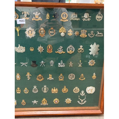 9502 - A collection of approximately 100 British regimental badges, mainly mid century and later, including... 