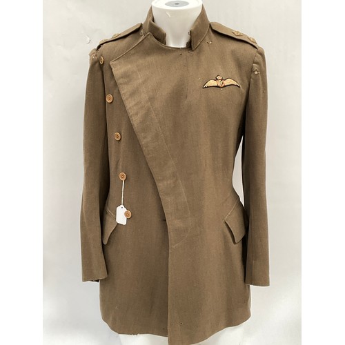 9515 - A WWI British Royal Flying Corps officer's 'Maternity' tunic, with RFC cloth badge to breast, some m... 