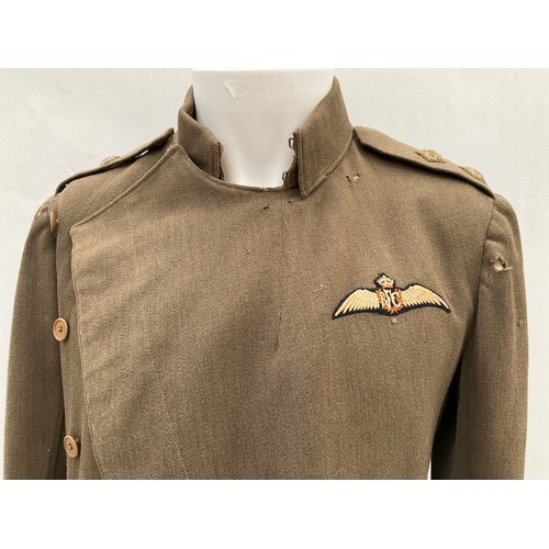 9515 - A WWI British Royal Flying Corps officer's 'Maternity' tunic, with RFC cloth badge to breast, some m... 