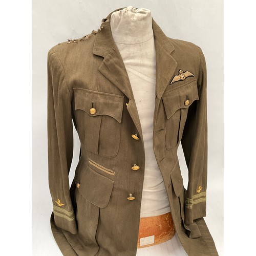 9515 - A WWI British Royal Flying Corps officer's 'Maternity' tunic, with RFC cloth badge to breast, some m... 