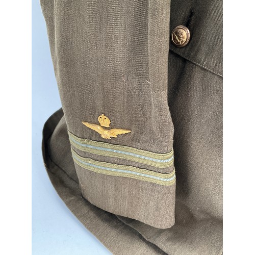 9515 - A WWI British Royal Flying Corps officer's 'Maternity' tunic, with RFC cloth badge to breast, some m... 