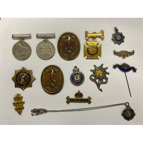 9518 - A quantity of medals and insignia including WWII Defence Medal and War Medal, RAOB medal and German ... 