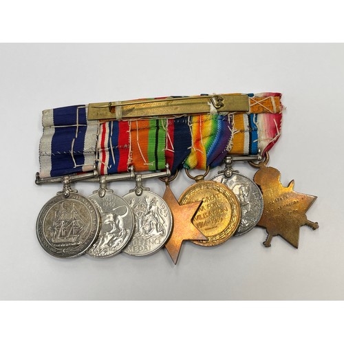 9511 - A WWI and WWII medal group of seven consisting of WWI 1915 star trio, WWII 1939-45 star, War Medal a... 