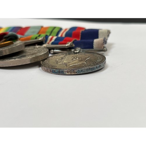 9511 - A WWI and WWII medal group of seven consisting of WWI 1915 star trio, WWII 1939-45 star, War Medal a... 