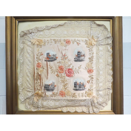 1002 - An embroidered lace trim cushion mount in gilt frame, 90cm x 92cm total    (E) £10-15