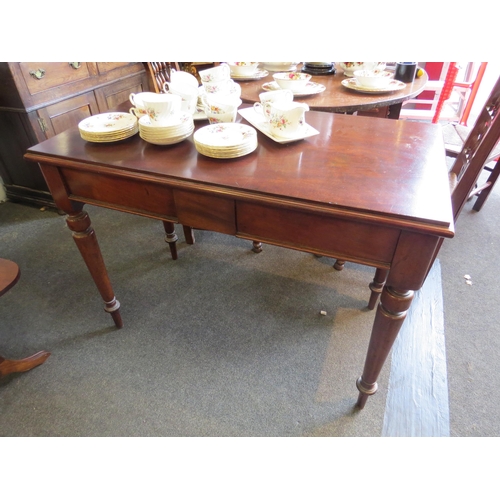 1021 - A mahogany side table with spindle-turned legs and two frieze drawers, 77cm high x 105cm wide x 55cm... 