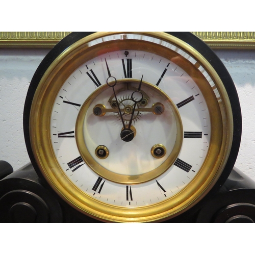 1029 - A large black slate mantel clock with key, 32cm high x 55cm long