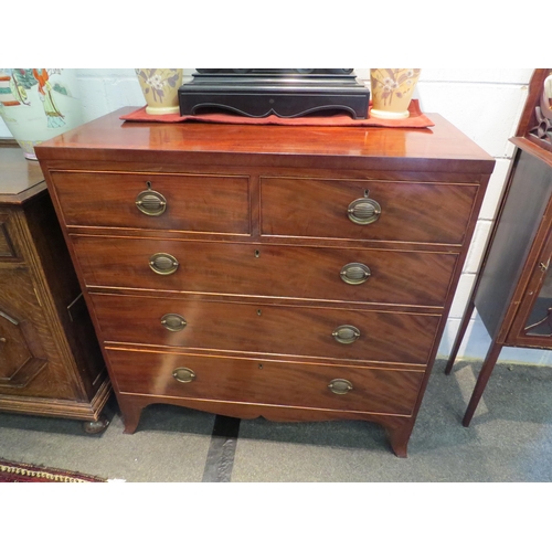 1030 - A late 18th Century mahogany straight front chest of two short over three long drawers on outswept b... 