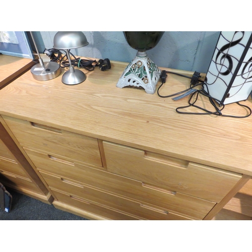 1069 - A modern light oak chest of two over three drawers with recessed handles, 95cm high x 91cm wide x 43... 