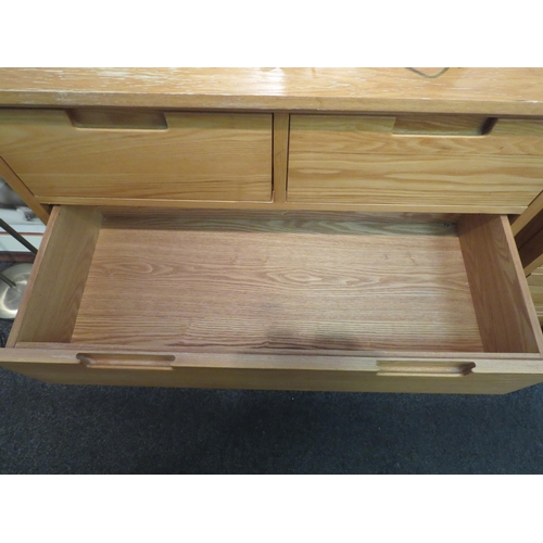 1070 - A modern light oak chest of two over three drawers with recessed handles, top worn, 94cm high x 91cm... 