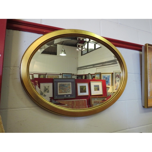 1085 - A modern gilt framed oval wall mirror with bevelled glass, 58cm x 78cm total    (E) £10-20