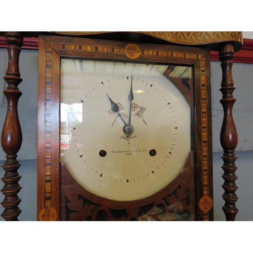 1097 - A circa 1900 Caledonion Clock Company USA drop dial wall clock, walnut cased with fretwork and inlai... 