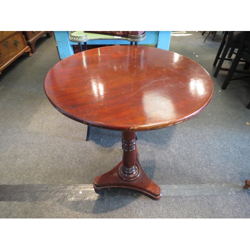 1107 - A Victorian mahogany occasional table, turned column to triform base, 74cm high x 60cm diameter