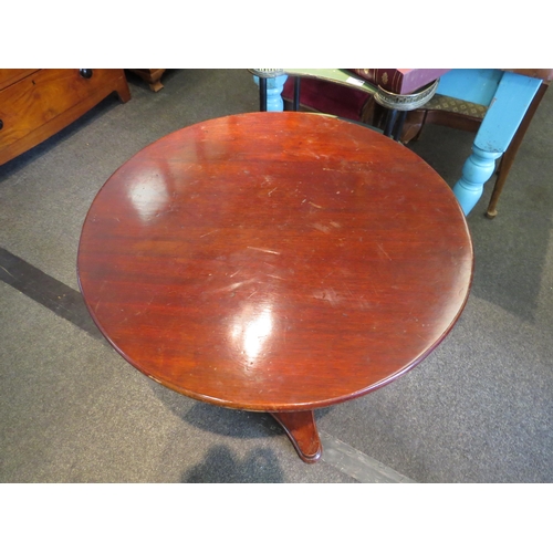 1107 - A Victorian mahogany occasional table, turned column to triform base, 74cm high x 60cm diameter