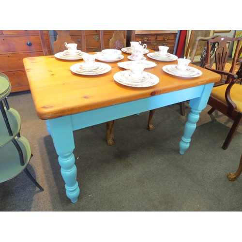 1111 - A pine kitchen table with blue painted base, 78cm high x 120cm long x 90cm wide