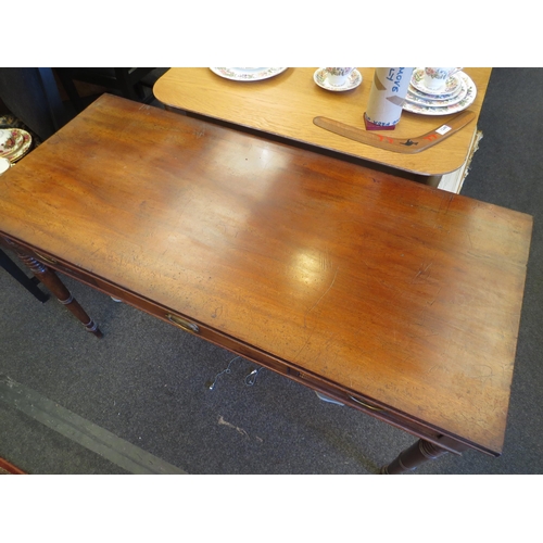 1191 - A late George III mahogany side table with three frieze drawers, on ring-turned cylindrical legs, 74... 