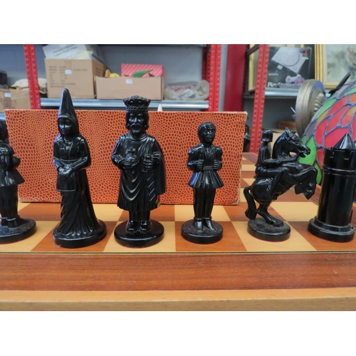 1226 - A mid 20th Century plastic chess set of Medieval style figures, wooden board, 44.5cm x 44.5cm