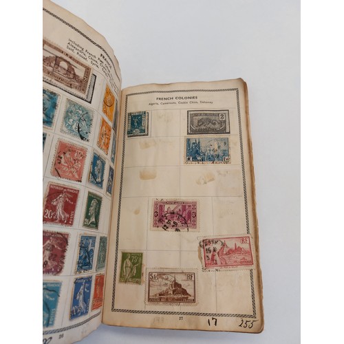 1552 - A stamp album containing world stamps         (E) £10-15